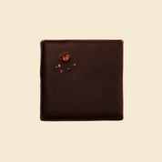 Snack de chocolate Chakra con frambuesa y nueces de macadamia