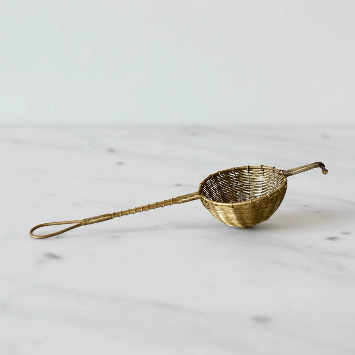 anima-mundi-small-tea-strainer-03_jpg.webp